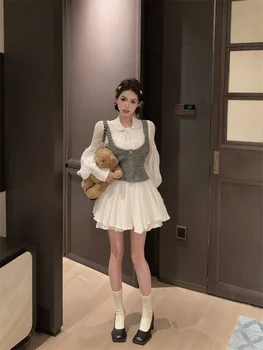 Корейская мода, модный дизайн, рукава-фонарики в виде дворца, текстурированное тысячеслойное платье на шнуровке, вязаный жилет, освежающий эстетический вид